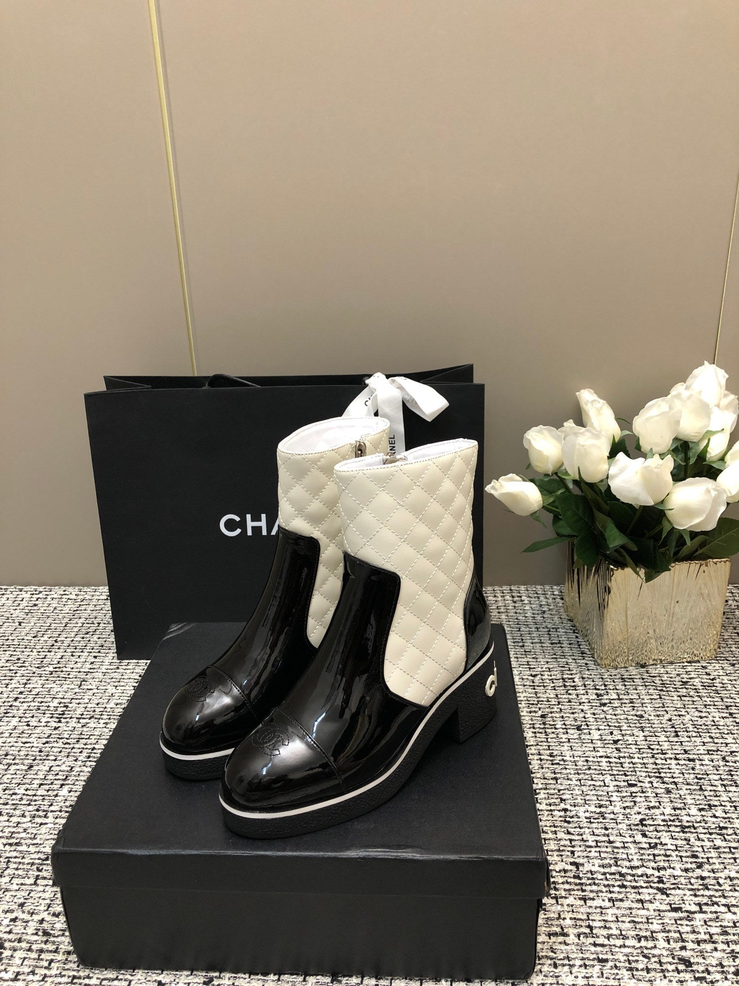 CHANEL ROUND-TOE SHORT BOOTS BLACK MIX WHITE SHEEPSKIN