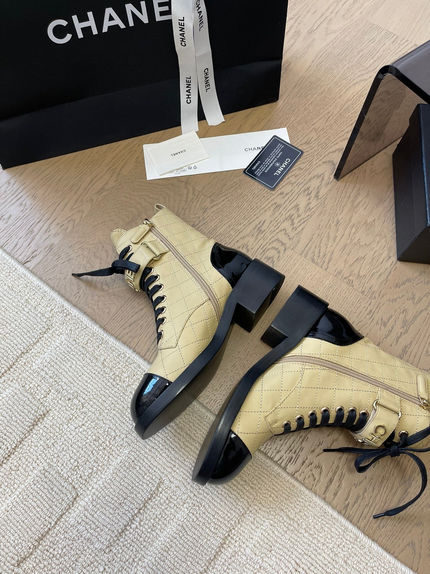CHANEL ALPHABET MARTIN BOOTS IN FLAX YELLOW LAMBSKIN