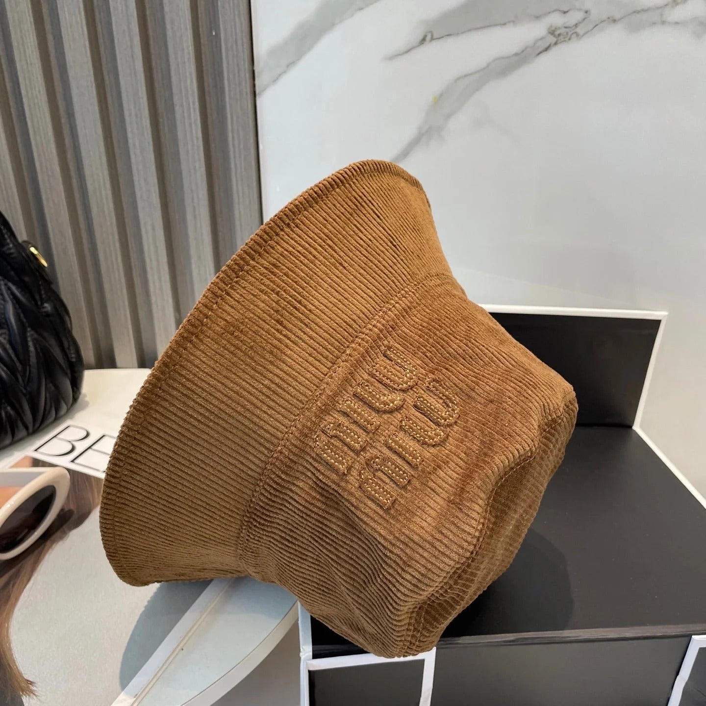 MM BUCKET IN BURNT ORANGE VELVET WITH LOGO
